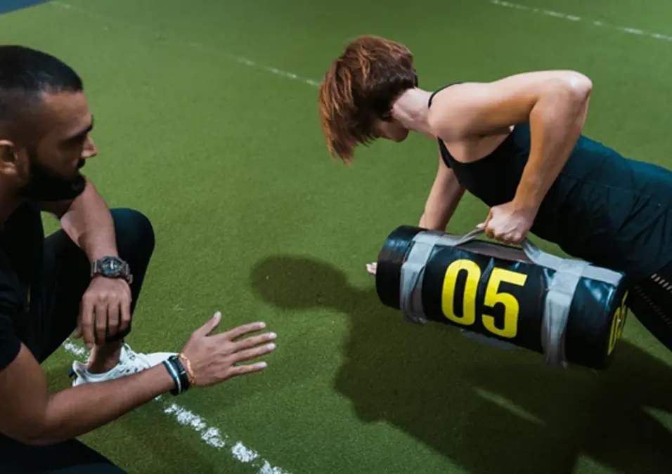 Woman With Personal Trainer 2